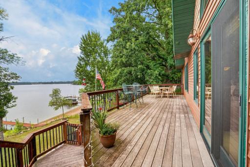 Large deck with stairs to the yard allows for lots of friends over for a BBQ