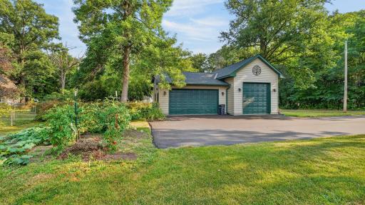 New 2023 oversized garage with RV/pontoon storage. New asphalt driveway.