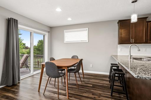 Dining room can fit a full table, or have a quick meal at the breakfast bar