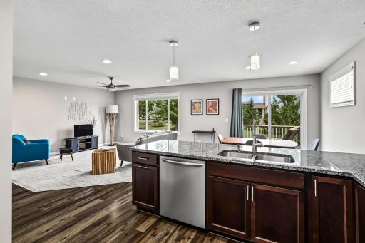 From the kitchen you can see nearly the entire main level, including onto the deck!