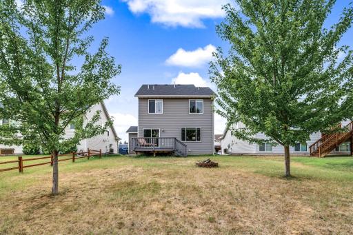 Enjoy the backyard firepit, and the quickly maturing shade trees