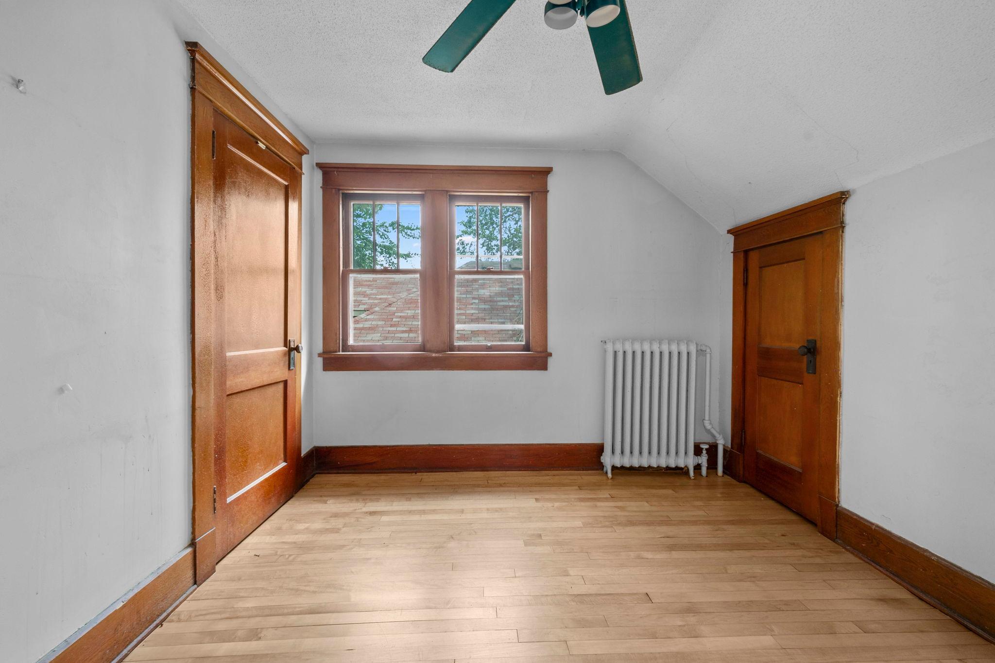 Twin closets add versatility to this 2nd upper-level bedroom.