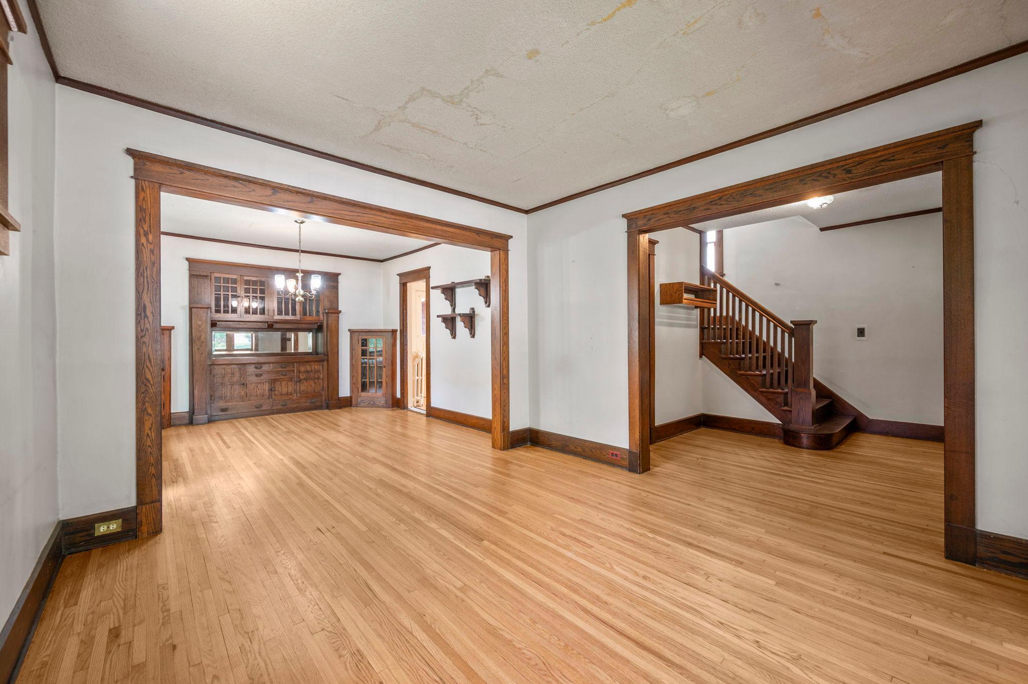 Gleaminig hardwood floors flow through the principal rooms.