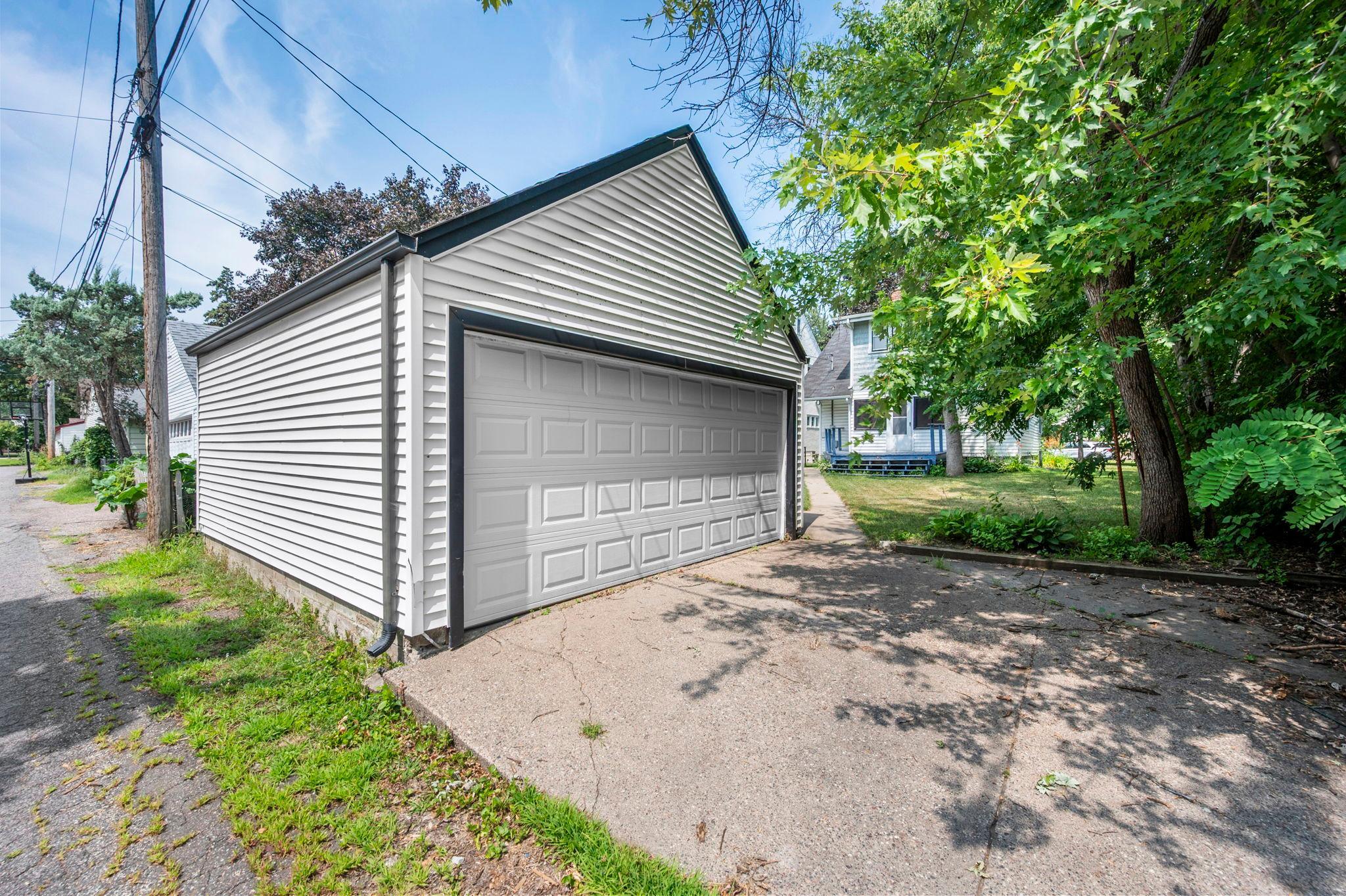 2 car garage and cement driveway.