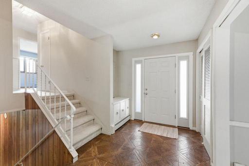 Bright, spacious Foyer with storage & closet