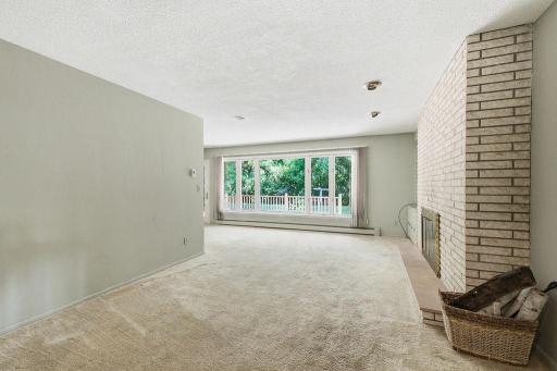 Bright and open Living Room with floor-to-ceiling Fireplace