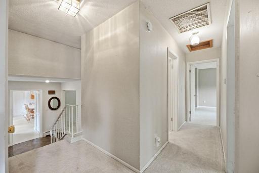 Bright upper level hallway, 4 beds on one level!