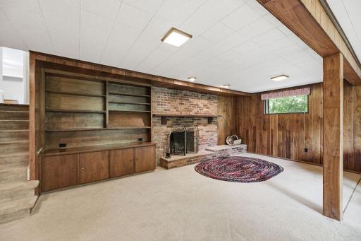 Built-ins, beams, fireplace, lots of windows