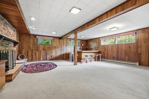 Spacious area great for lounging, rec room, bar area & more!