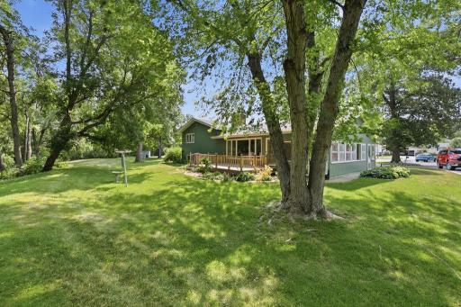 Back of Home and yard with mature trees