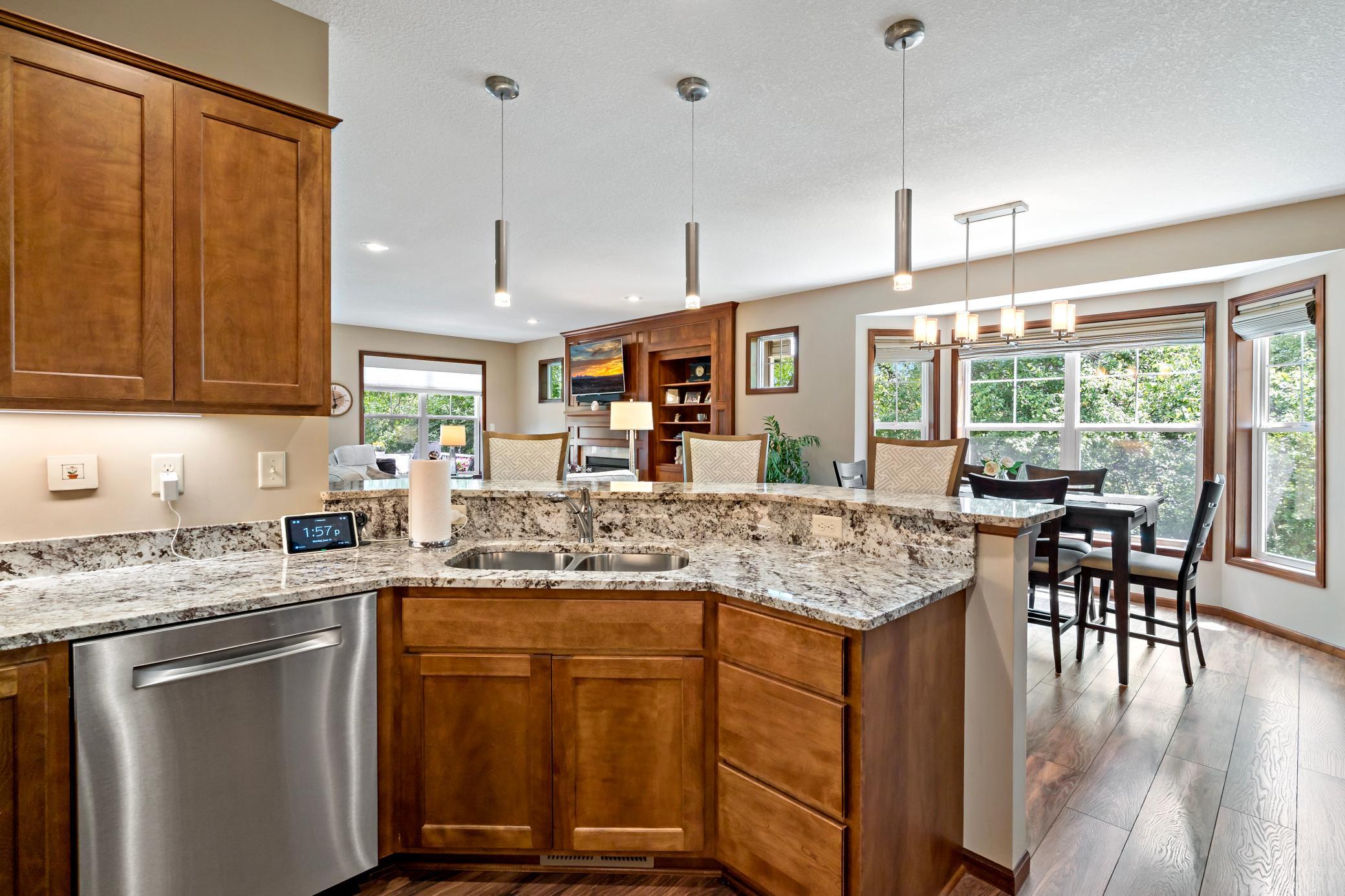 Never feel "stuck" back in the kitchen again! The layout was designed to allow one to prepare meals and treats while still engaging with friends or family.
