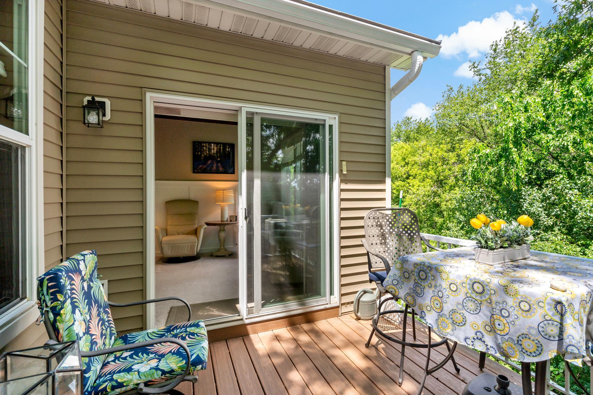 Stepping off your maintenance free deck into your sunroom.