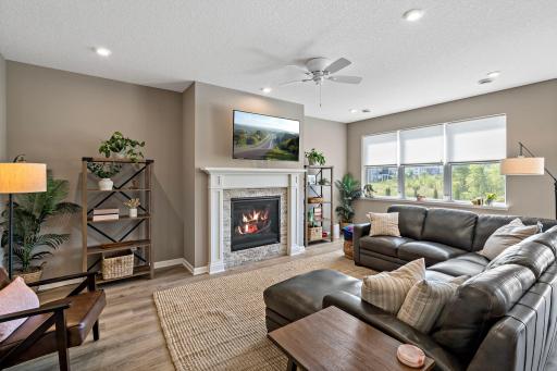 Open Family Room with Gas burning fireplace