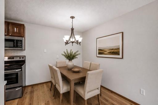 Another view of the dining room, virtually staged