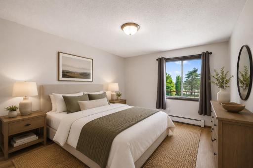 Second bedroom, also with a wonderful view, virtually staged