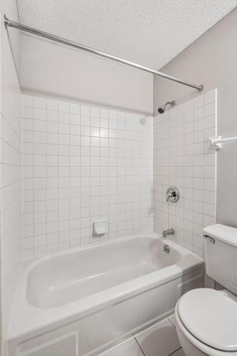 Beautiful tile surround in both bathrooms