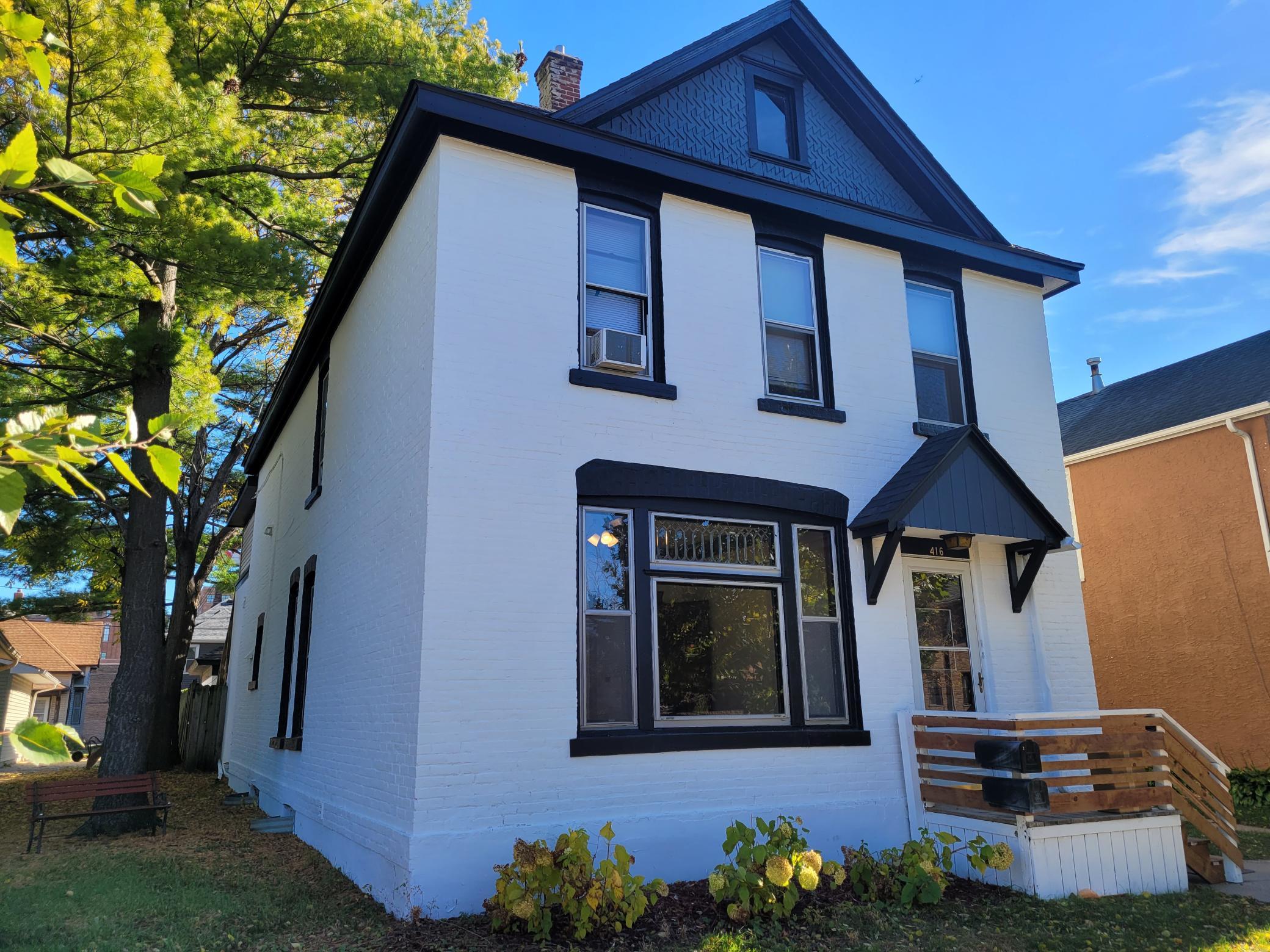 Charm galore in this all brick duplex.