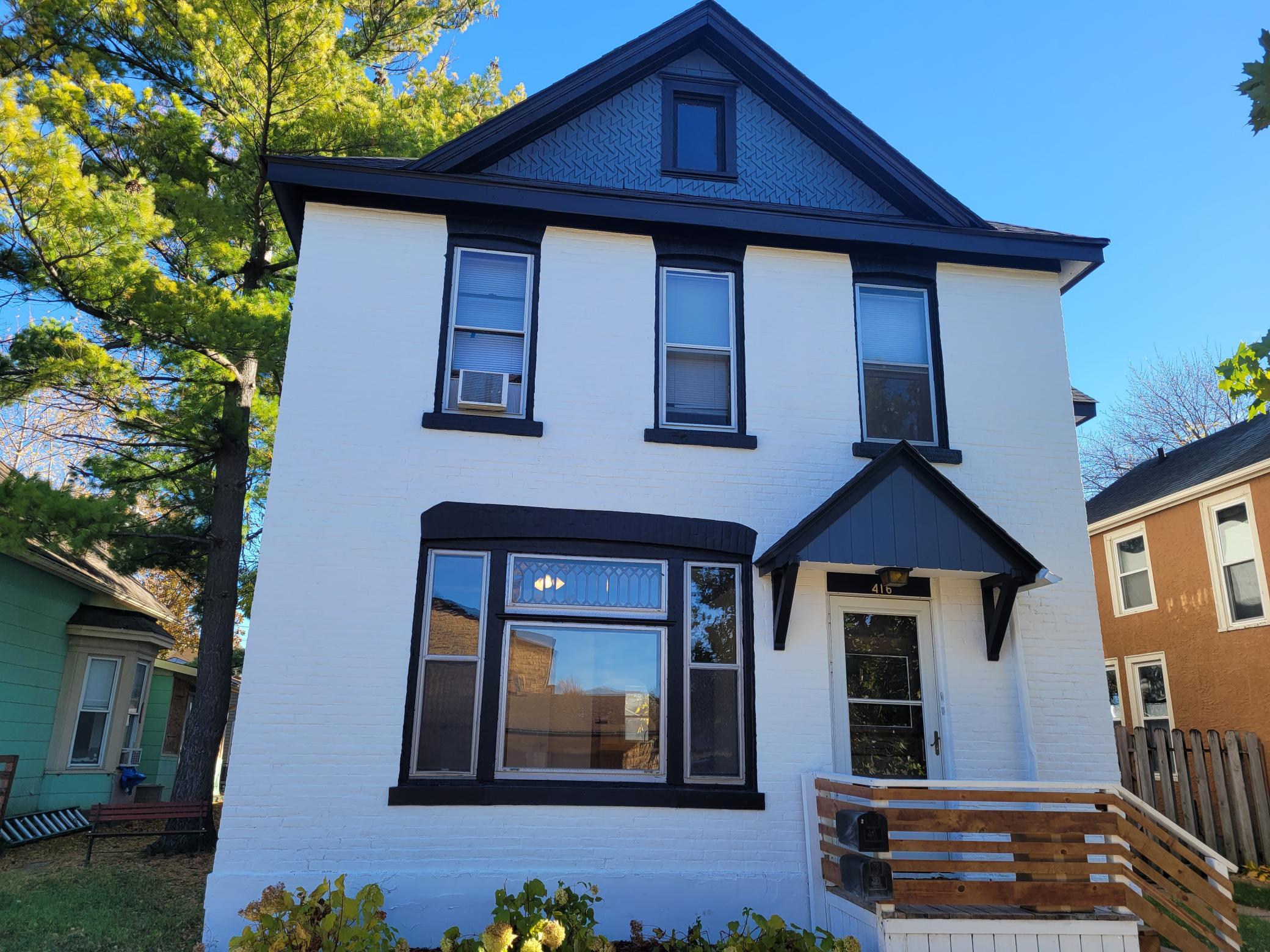 Front of duplex with fresh paint.
