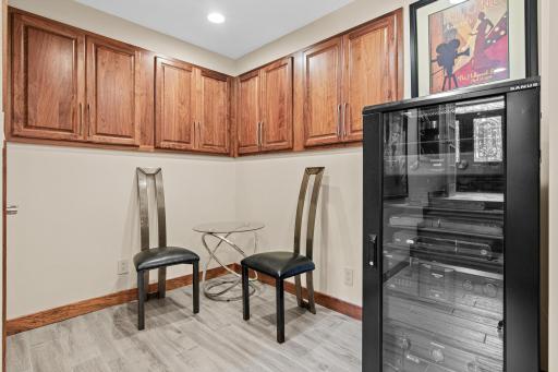 Located just off the family/theater room, perfect for media and plenty of storage.