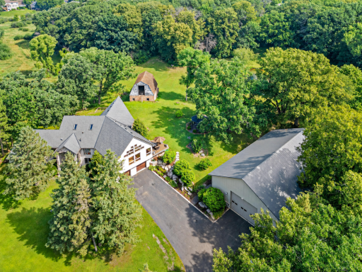 Photo for 6300 Rolling Hills Drive, Saint Paul, MN 55110 - listing #7117234 Ten acres with a pond, a 2,700 sq ft steel outbuilding, a vintage barn & Gazebo. Enjoy the feeling of being far away while still being just minutes from lakes, shopping, downtown White Bear Lake, and quick access to 35E.