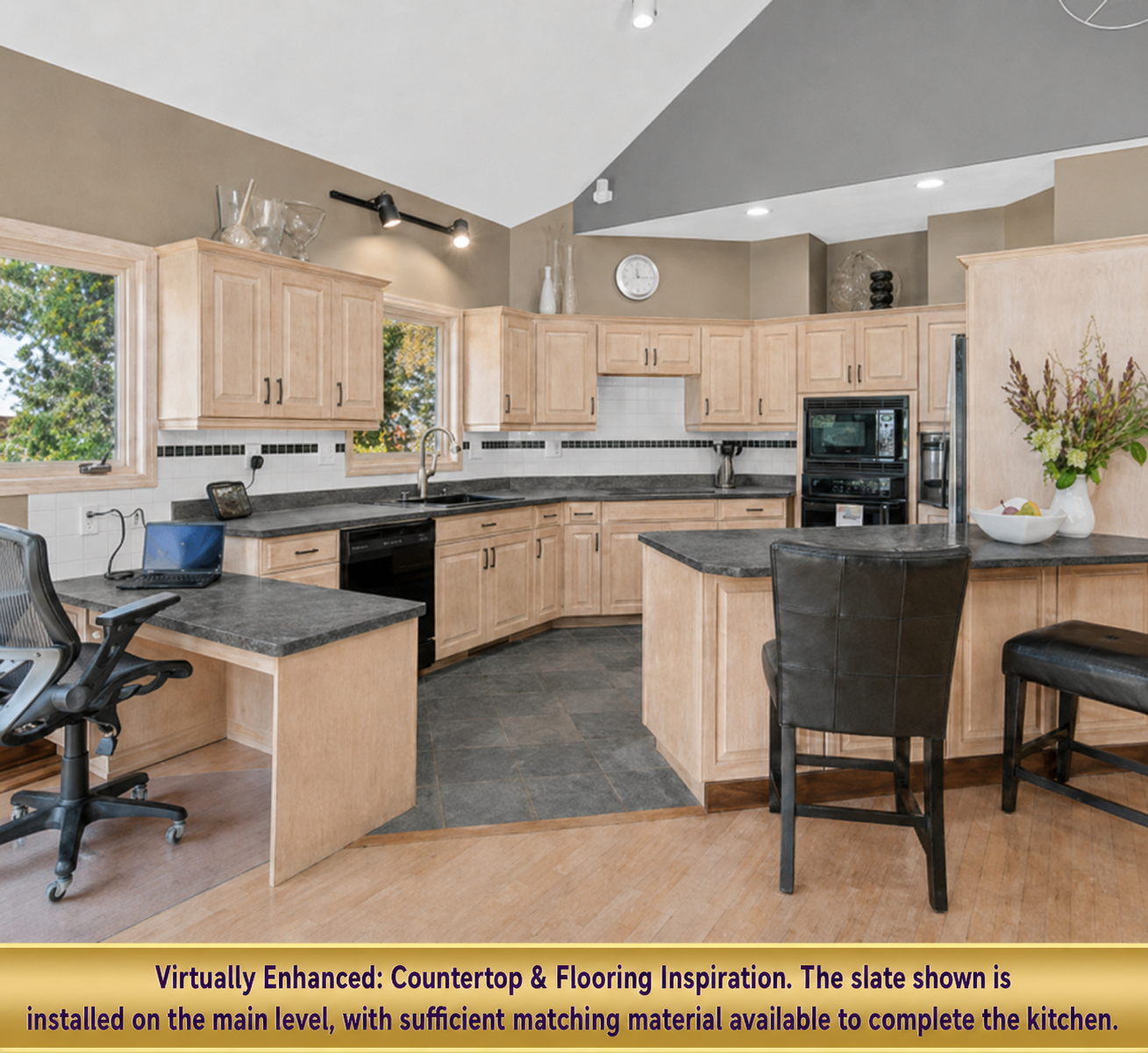 The kitchen features virtually enhanced countertops and flooring. Additional slate flooring, as see