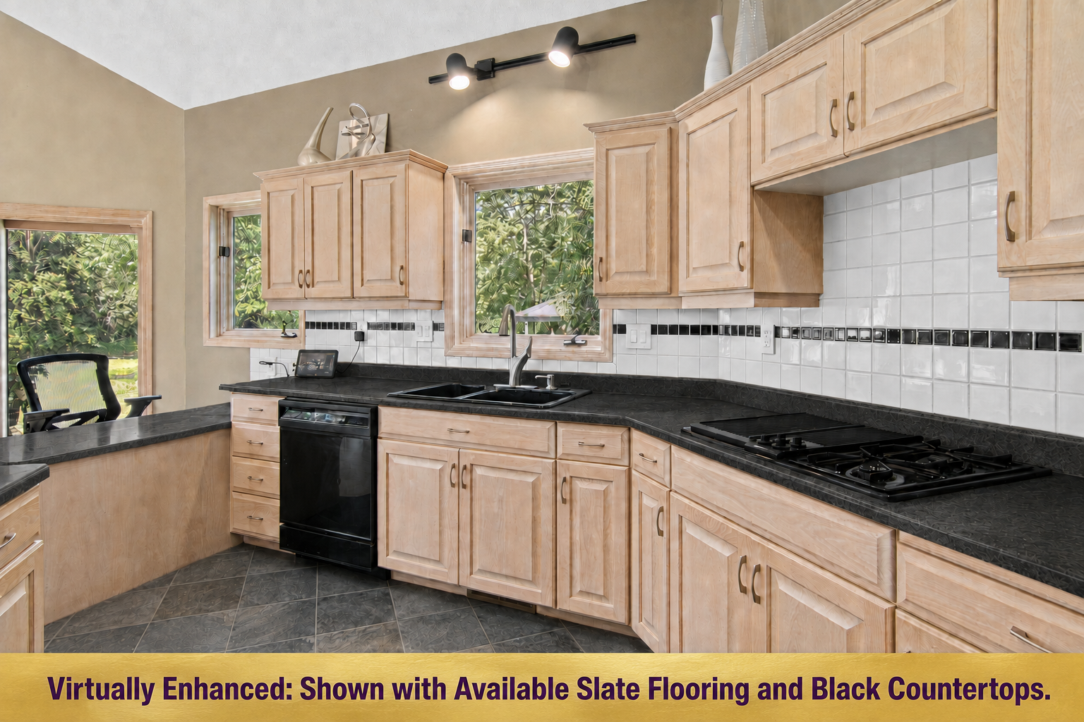 Virtually enhanced kitchen with countertop change and slate floor that are in the main floor entry/mudroom. There is additional slate that will be left for the new owners.