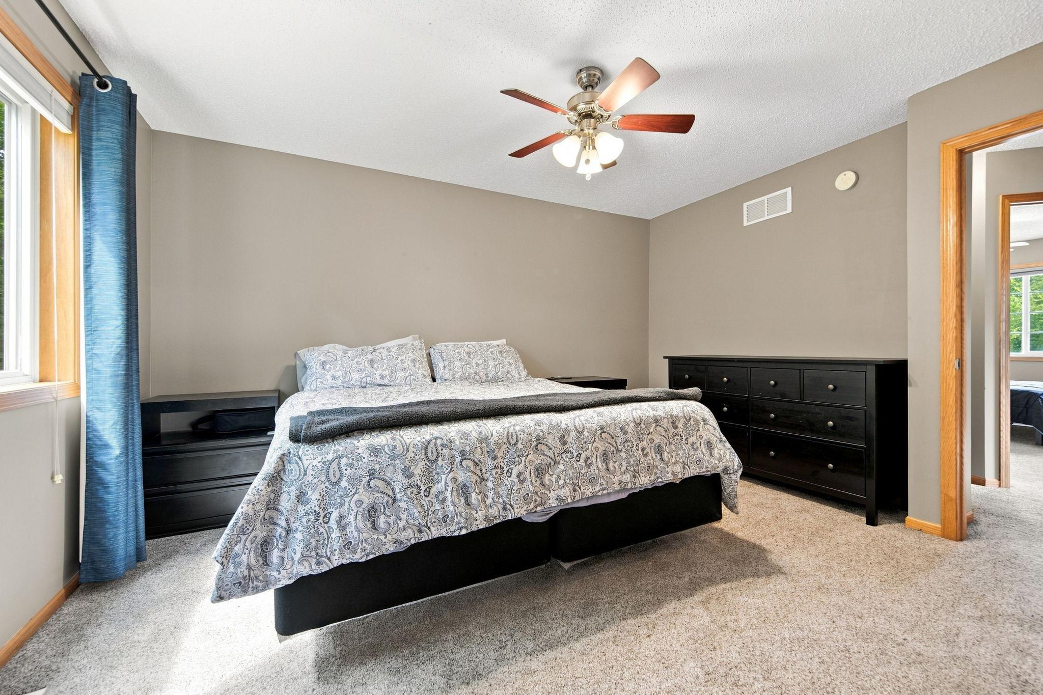 Upper level primary bedroom.