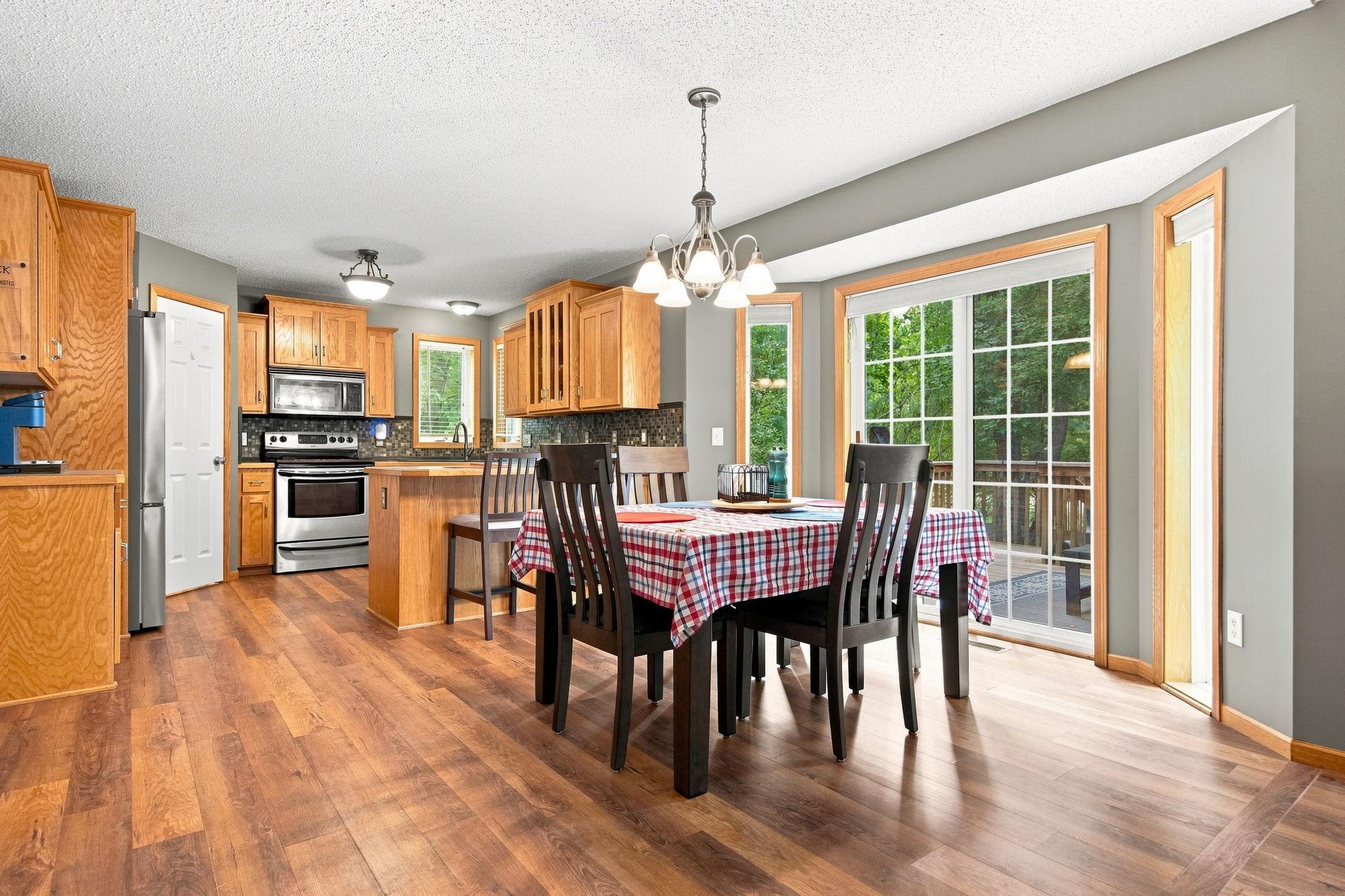 Dining room features a sliding patio door to the deck.