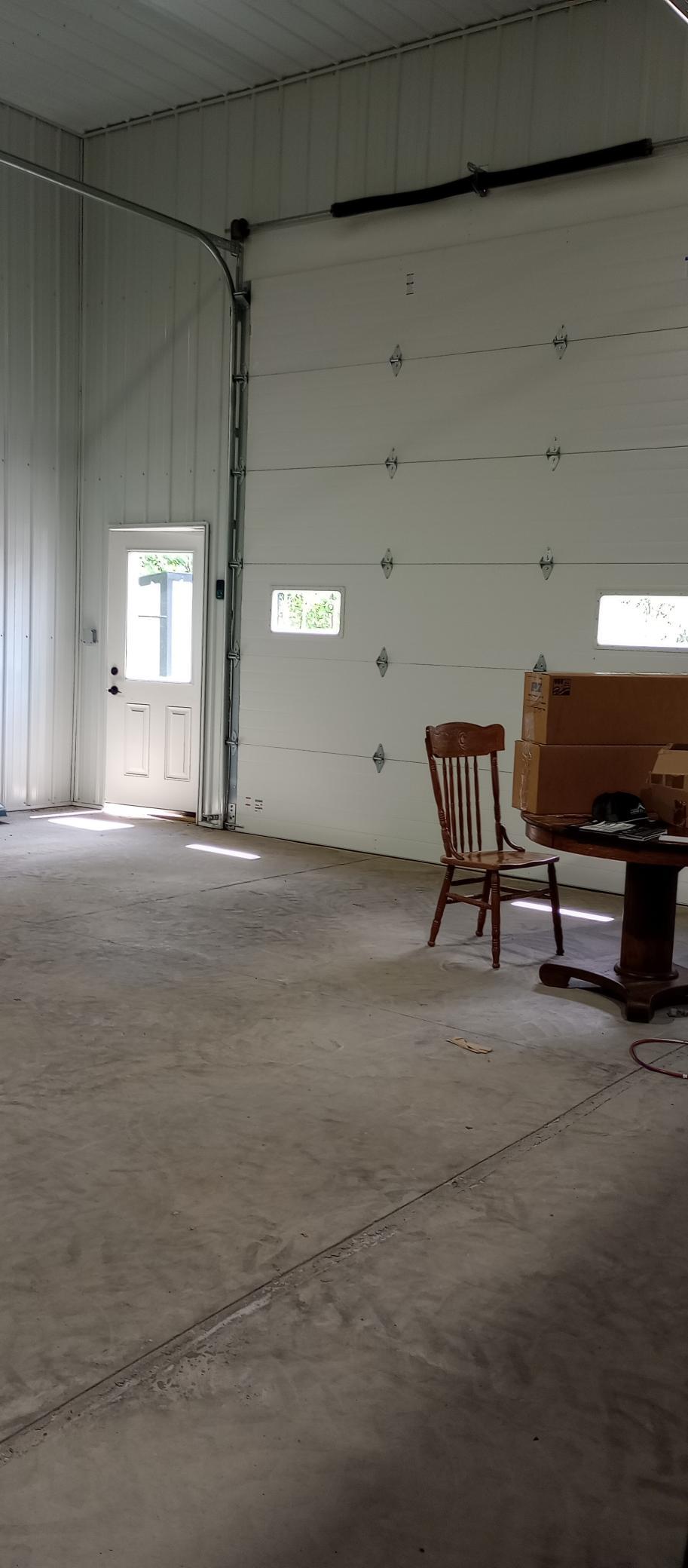 Entrance door and 12' overhead garage doors