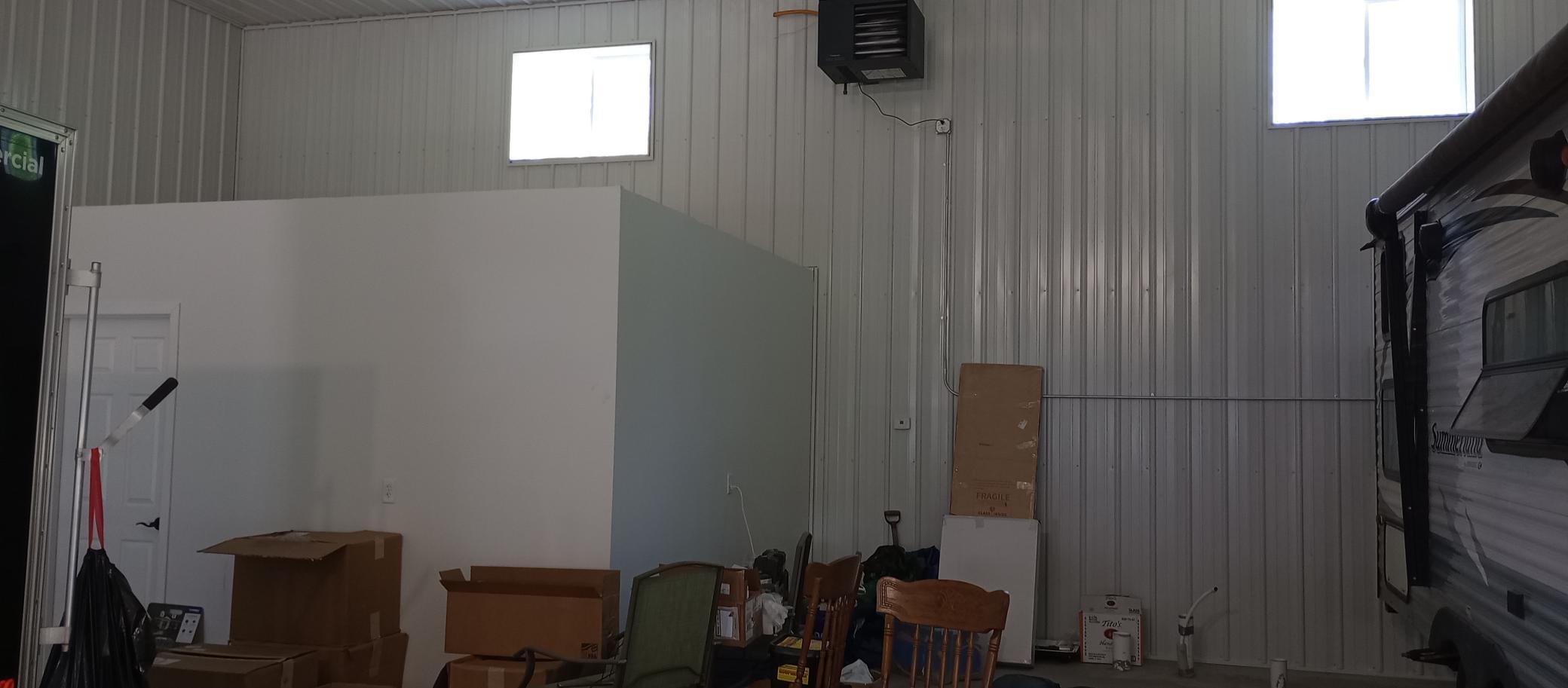 2 windows and 80,000 BTU heater on the wall