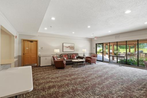Large party room for hosting or hanging with neighbors.