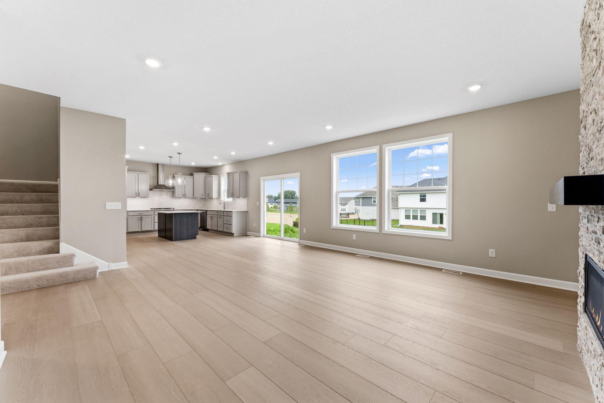 The open floorplan provides ample light and flow to this stylish home