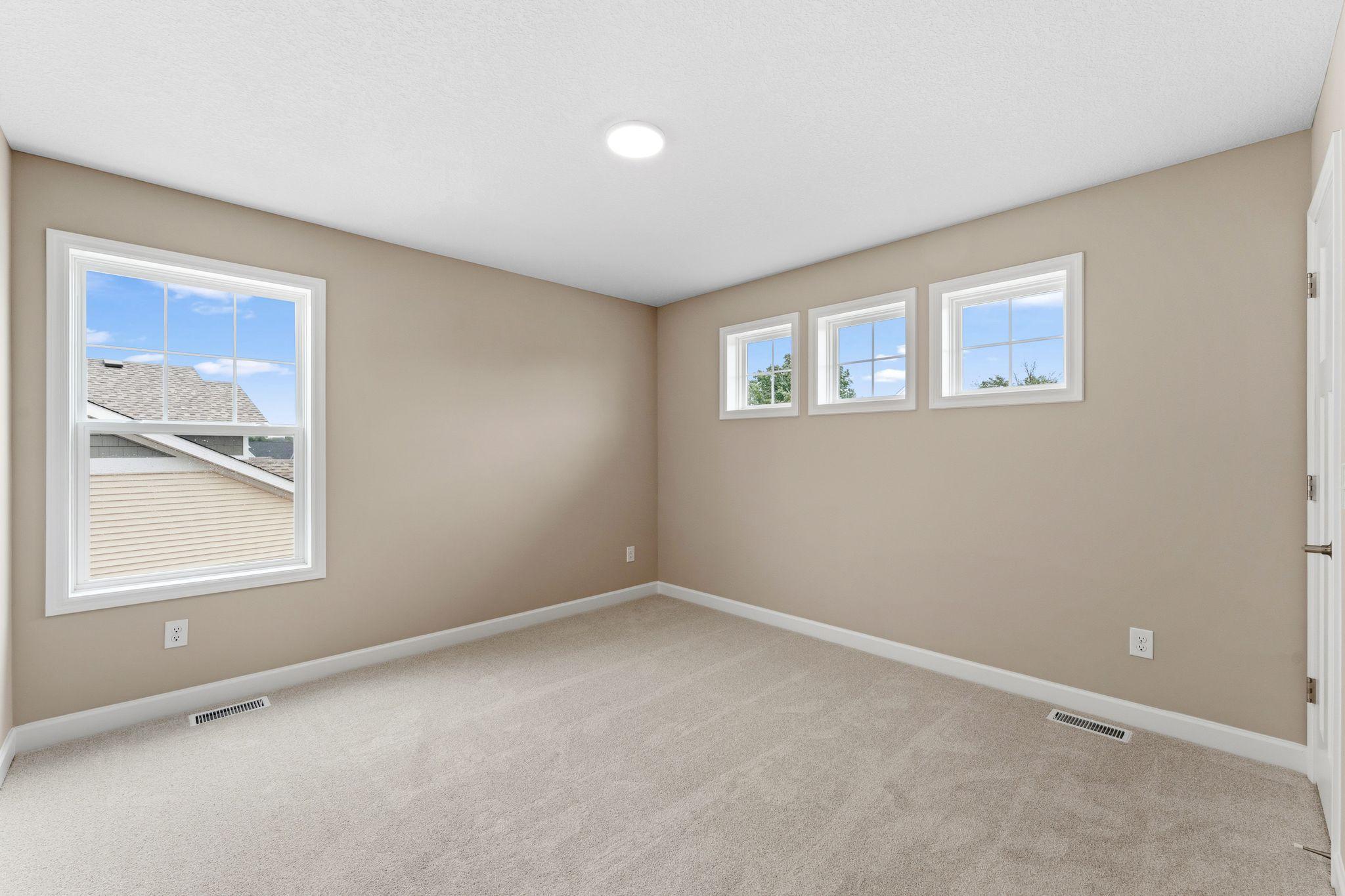 The loft area is located at the top of the stairs on the second floor and is well-suited for a living room or children’s area.