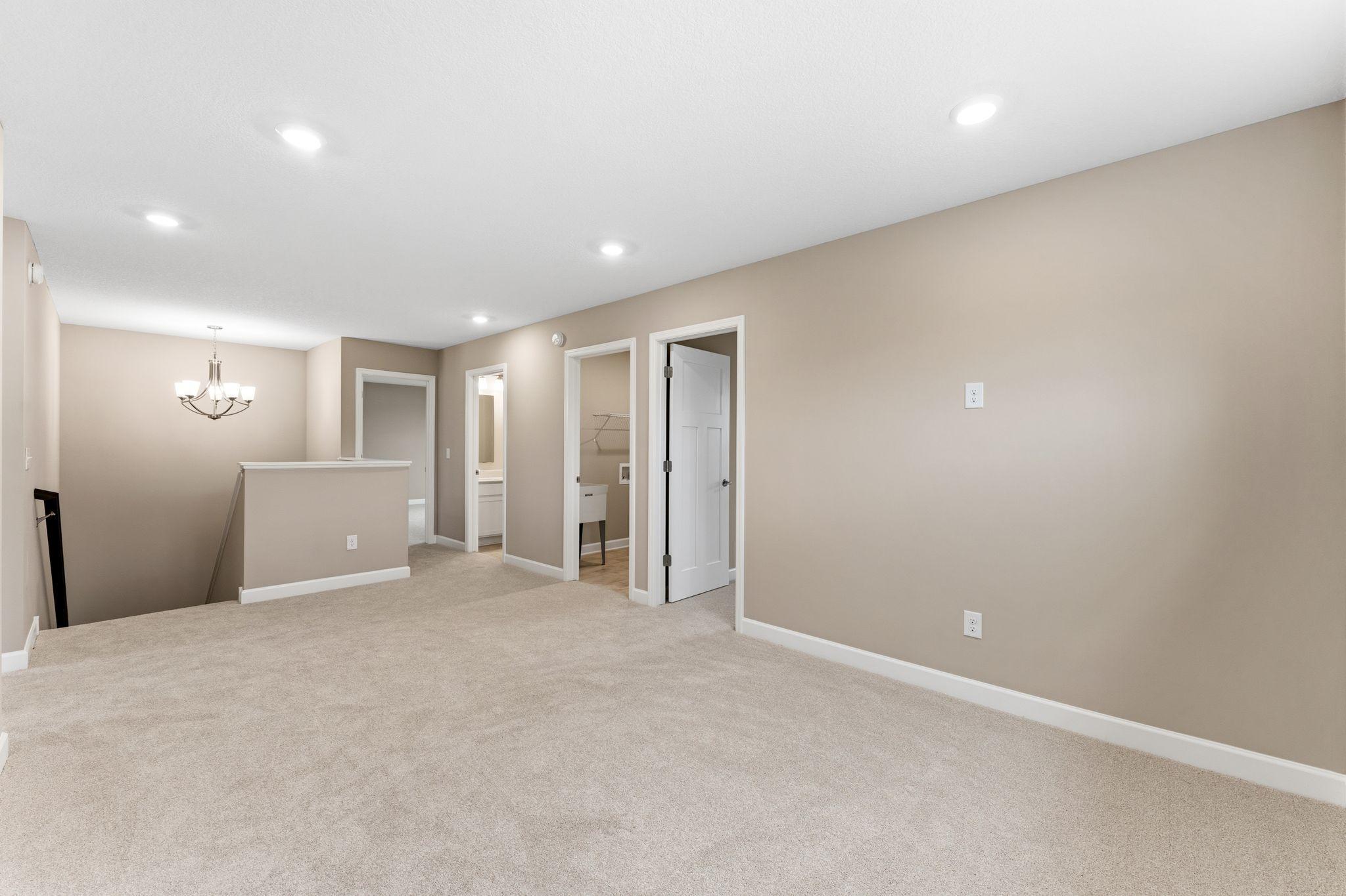 The upper landing offers ease of access to upper level living spaces