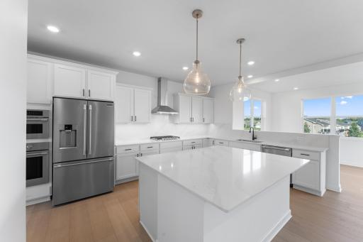 (All the following photos are of a similar home, actual finishes may vary.)