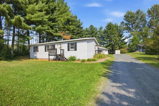 Renovated manufactured home and detached 3-car garage on a .61-ace lot
