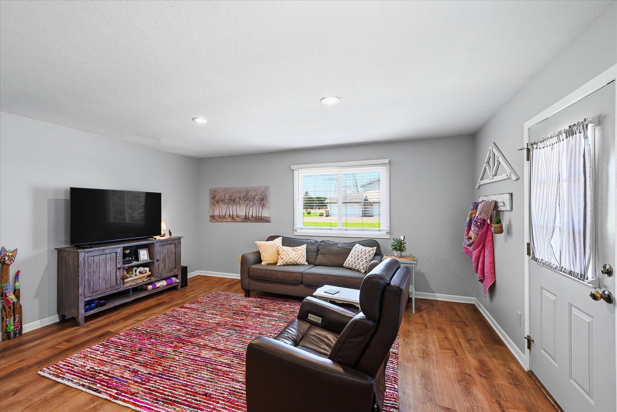 Plenty of wall space for an entertainment center.