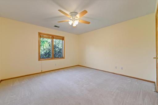 Upper level 3rd Bedroom that adjoins a Jack and Jill full bath - this room looks to the front/north