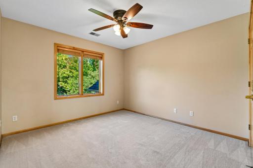 Upper level 2nd Bedroom with a 3/4 bath ensuite that looks to the north/front