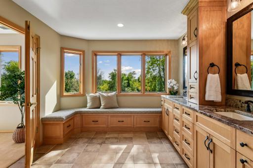 Custom seating area overlooking the pond