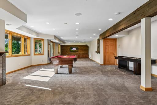 Professionally remodeled lower level (the pool table and shuffleboard game can be included in the sale.