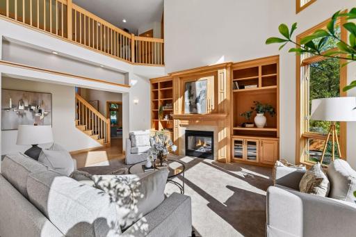 Dual sided gas fireplace that is shared with the main floor office