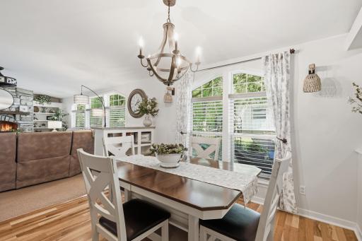 Peninsula storage in the dining space provides a serving counter for entertaining.