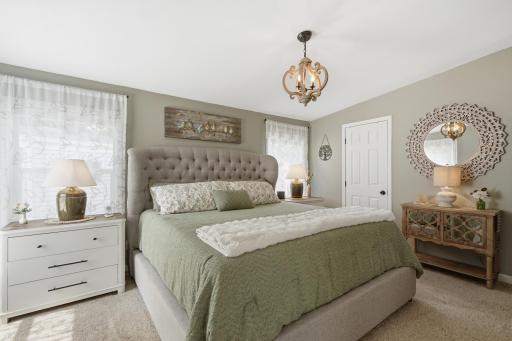 Fabulous light filters in throughout the day and your private full bath serve this primary suite.
