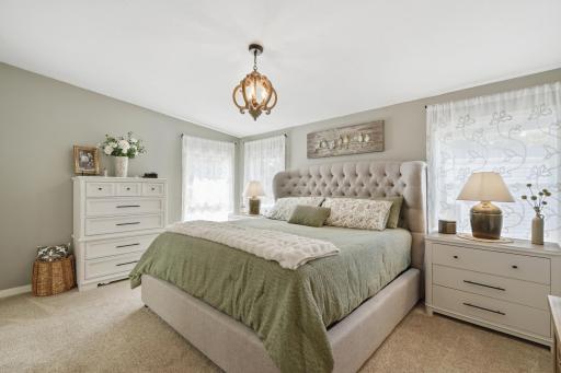 The primary suite is a real show stopper! Plenty of room to arrange the furniture you need for this space.