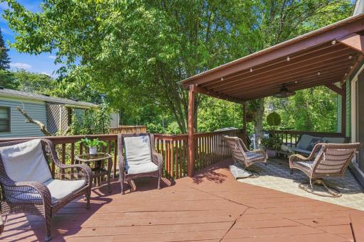 The freshly stained deck is the perfect spot to enjoy the tranquility of your natural surroundings.