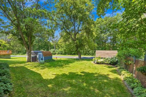 The backyard is level for easy maintenance and great flexibility for your outdoor needs.