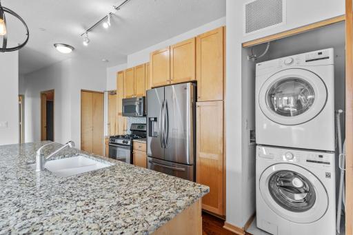 Stackable washer / dryer in unit