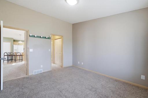 Primary offers double walk-through closets to ensuite Hollywood Bath