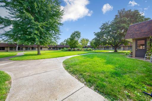 Spacious landscaped grounds surrounding the building